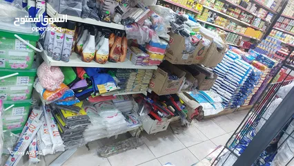  2 محل تجاري بابين للبيع خلو مع البضاعة