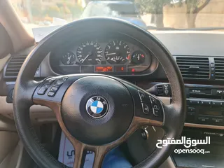  6 BMW 318 2002