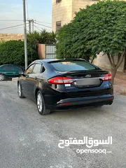  22 فورد فيوجن هايبرد 2017 للبيع وارد أمريكي فل كامل ما عدا الفتحه فحص 7 جيد كلين تايتل
