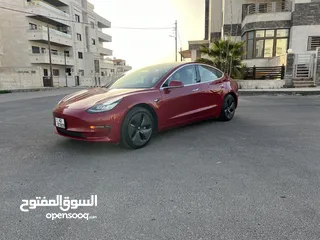  1 Tesla 3 فحص  جمرك جديد ماشيه 40 الف فقط لون خمري مميز