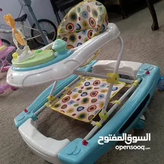  1 كراجة مشي مع هزاز للأطفال بلونها المناسب وسعرها اللطيف
