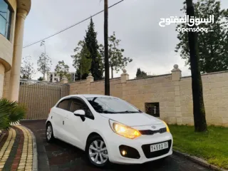  2 كيا برايد 2015 فل اوتماتك ترخيص وتأمين شامل  جديد ..صلاة النبي بحالة ممتازة ونخب النخب الله يبارك