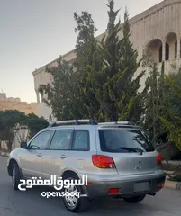  4 متسوبيشي اوتلاندر 2003 بحالة الشرگه
