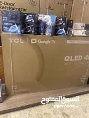  1 شاشه tcl 75