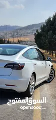  4 Tesla Model 3 Standerd Plus 2022 ابيض وداخليه ابيض جمرك جديد شهر 12‎ بسعر 20 الف بدون الرقم