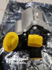  4 طرمبة ماء bmw  اصلية