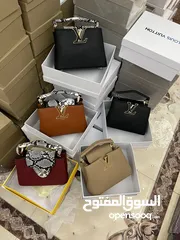  1 شنط ماركة لويس فيتون