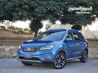  1 بسعر مغري بداعي السفر MG RX5 2020 بحالة الجديدة وارد وكفالة الوكالة فل الفل أعلى صنف فحص اوتوسكور A