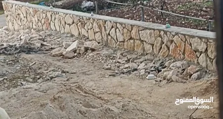  8 مقاولات بناء جدران حجر طلياني تبليط ساحات حجر  تعمير اراضي وتشييك وبناء جدران سلاسل حجرية