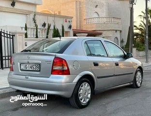  8 ‎أوبل استرا موديل 2001  وارد الوكالة ومالك واحد فقط من الشركة عداد 100الف كيلو فقط