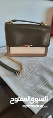  1 شنط مايكل كورس و فوسل