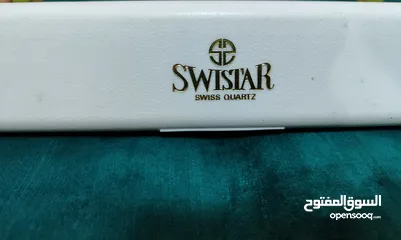  2 ساعة رجالية Swistar swiss Quartzسويسريةالصنع مطلية ذهب عيار 18عليها صورة العقيد القذافي