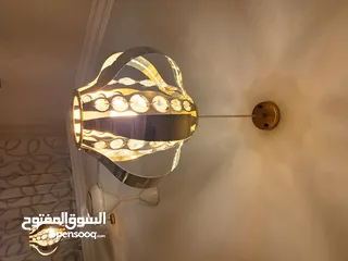  2 ثريا لون ذهبي مع ليد كريستال ( ستينلس ستيل) عدد 2 مستعملة بحالة ممتازة