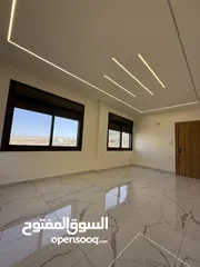  12 شقه طابق ارضي 144متر مع ترس 30 متر للبيع في جبيهه حي المنصور بموقع مميز