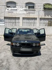  11 E34 BMW   اسود 6 سلندر