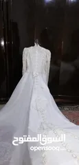  1 فستان زفاف أبيض