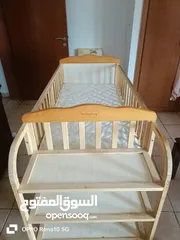  1 fully wooden baby bed