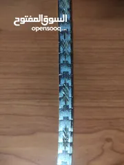  2 Stainless steel bracelet with starburst engraving. سوار ستانلس ستيل مع نقش متكرر لإنفجار نجمي