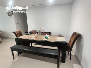  7 Dining table (The ONE), benches, chairs (Marina) for AED 800.
