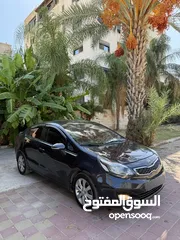  10 بالورقة كيا برايد 2014 اتوماتيك لون بترولي مميز فل اضافات فقط 44 الف كاش صالون فحص نخب سيارة لعبة
