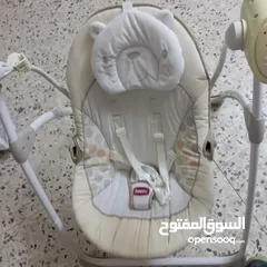  2 مرجيحة بيبي جونيورز  وجهاز تعقيم و تسخين الرضاعات