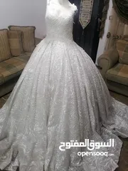  10 بدلات زفاف وخطبة وملون... فساتين زفاف وخطبة وملون وطرحات عروس وتوربان عروس