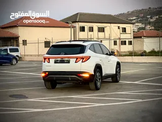  9 هونداي توسان 2023/ فل الفل فتحة سقف بانوراما  2x4 ///240Hp بنزين + كهرباء  ( Haybrid) 1600cc