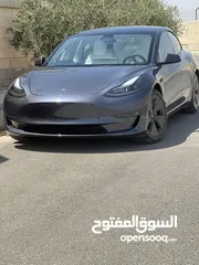  1 tesla model 3 2023 لون مميز