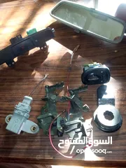  2 قطع سيارات لقمتين ابواب وا كبسة رباعي لمتسوبيشي لانسر  وكمبيوتر مرسيدس  منضم البنزين