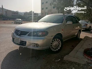  1 نيسان صني ياباني 2001 محدثة 2012  فل اوتوماتيك عدا الفتحة لون سلفر