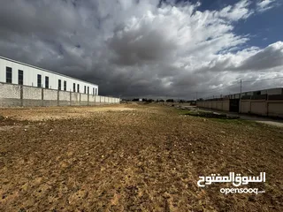  4 أرض للأيجار أو الاستثمار تصلح لبناء هنجر و مستودعات او كراج شاحنات خلف مقبرة المسيحية قرب الترخيص