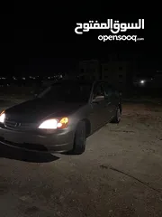  4 هوندا سيفيك هايبرد 2003