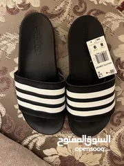 2 Adidas comfort slides