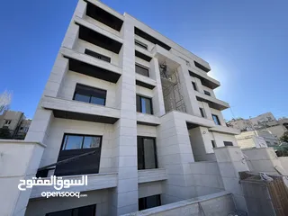  2 اخر شقة ارضية استثمارية 100 متر مقسمة الى استديو عدد 2 في ضاحية الرشيد خلف الجامعة الاردنية مباشرة