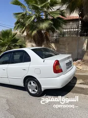 2 هيونداي فيرنا لون ابيضّ مميز موديل 1999
