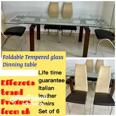  2 Uk product Italian leather chairs with foldable tempered glass table