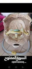  3 A 4 year old baby swing used but it works well. It works with electricity and it has a transformer f