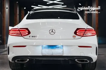  4 Mercedes C300 Coupe AMG  2020 7000km 2000cc ابيض فرش احمر وكيل مرور النزهة  رخصة سارية حتي 10/2024