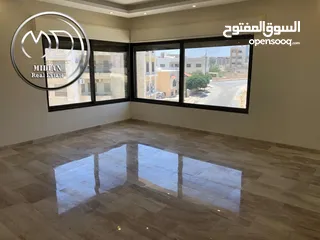  8 شقة جديدة للبيع ام السماق طابق اخير مع روف مساحة 180م اطلالة جميلة بسعر مميز جداً