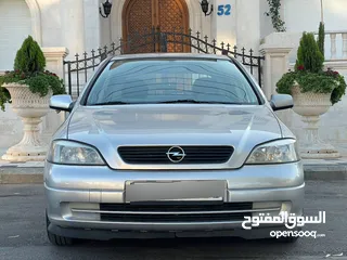  2 ‎أوبل استرا موديل 2001  وارد الوكالة ومالك واحد فقط من الشركة عداد 100الف كيلو فقط