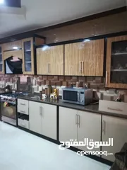  10 شقة طابقيه ارضيه مع تسويه للبيع في ابو نصير