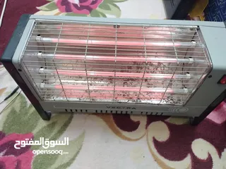  2 مدفاة كهربائيه اربع شمعات