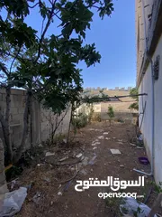  6 فرصة استثمارية وسكنية مميزة في ماركا الجنوبية – عمّان ( بيت مع ثلاث محلات للبيع )