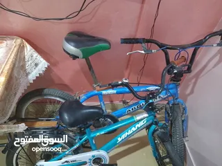  1 دراجة صغيرة من سن 7 ل12 سنة ودراجة BMX كبيرة من سن 13ل 15 سنة