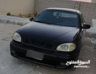  5 دايو لانوس 1997 لون باذنجاني ( خمري )