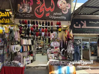 1 محل تجاري عطور ومكياج وشالات بسوق الوحدات