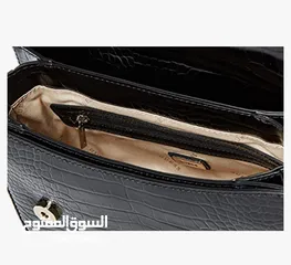  1 شنطه يد 2024