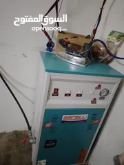  1 ماكنة مكوى بخار