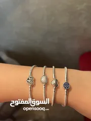  28 اساور باندورا الاصليه و مختومه مع فل بكج