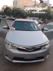  1 تويوتا كامري 2014 مرخصه و مامنه لشهر 12 مش ناقصها اشي نهائيا السياره بالصلاه على النبي مش ناقصها اشي